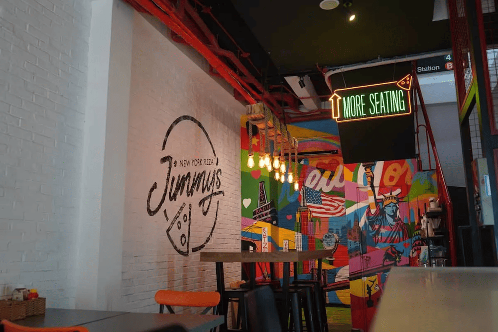 The venue embraces a friendly, laid-back American vibe reminiscent of a classic New York pizza joint (Source: Jimmy's New York Pizza)
